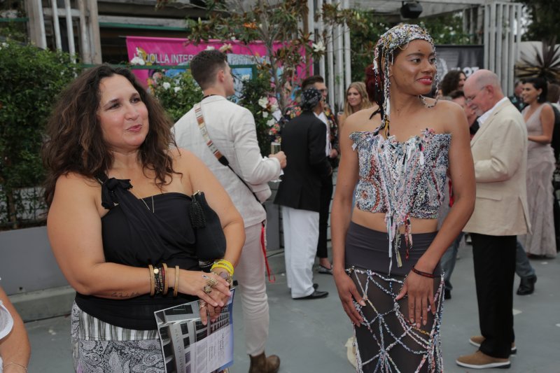 Natasha Cobb, right, in a dress designed by Monique Guzman, left